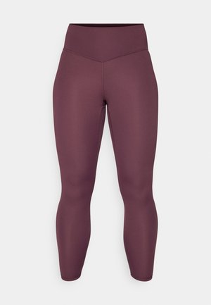Høyt liv, tettsittende leggings i en dyp burgunderfarge. Laget av glatt, elastisk stoff uten synlige mønstre eller metallkomponenter.