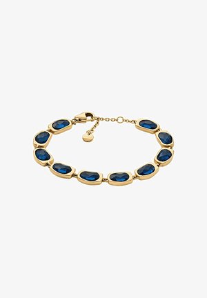 Pulsera de tono dorado que presenta ocho gemas ovaladas azules con superficies facetadas, unidas por engastes metálicos suaves. Incluye un cierre de langosta y una cadena de extensión.