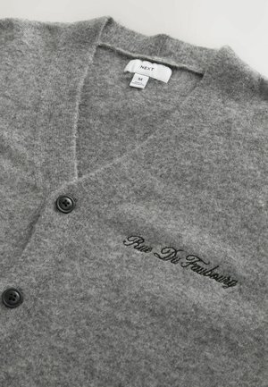 Gray cardigan made of soft material featuring a V-neck, two black buttons, and embroidered text "Rue De Faubourg" on the front.