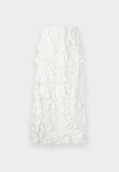 Hvit ankellang skjørt laget av intrikat blomsterblonde med bølget kant. Elastisk midje for en avslappet passform. Teksturert, delikat mønster.