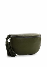 Green leather clutch bag with a round shape, textured surface, silver zipper closure, and decorative tassel detail.