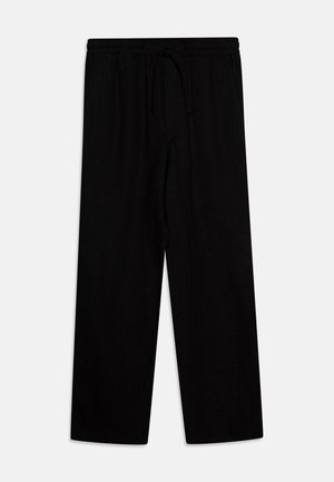 Pantalons larges noirs en tissu doux avec une taille élastique et un cordon de serrage ajustable. Aucunes poches ni motifs visibles.