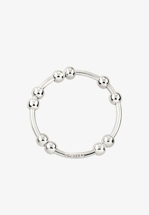 Sølvring med en glat bånd og jævnt fordelte sfæriske accenter. Markerede med "JGJ 925 A9" for ægthed.