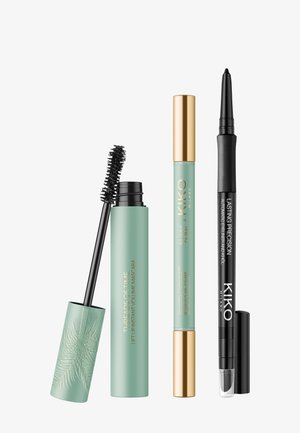 Mascara met een open borstel, gesloten groene eyelinerbuisjes met gouden doppen, en een zwarte uitschuifbare eyelinerpotlood met de dop verwijderd.