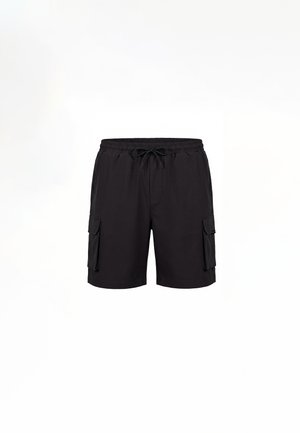 Shorts cargo noirs avec ceinture élastique et cordon de serrage, dotés de deux poches à rabat sur les côtés.