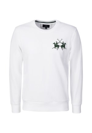 Witte trui met lange mouwen en ronde hals, met een klein donker groen logo van twee polospelers te paard met gekruiste knuppels op de borst.
