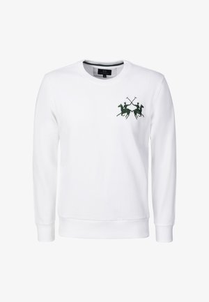 Valkoinen, pitkähihainen pyöreäkauluksinen collegepaita, jossa on pieni tummanvihreä logo, jossa on kaksi ratsastavaa polopelaajaa ristikkäisillä mailoilla rinnassa.