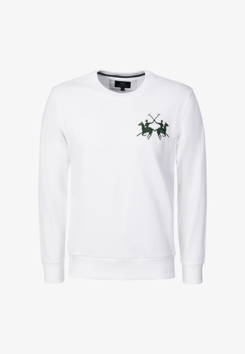 Witte trui met lange mouwen en ronde hals, met een klein donker groen logo van twee polospelers te paard met gekruiste knuppels op de borst.