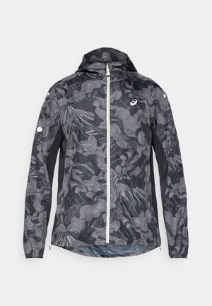 Leichte schwarz-graue Windjacke mit Wellenmuster, Reißverschluss vorne, verstellbare Kapuze und elastischen Bündchen. Verfügt über reflektierende Akzente.