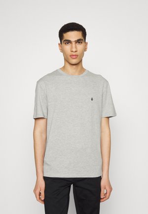 Gray cotton t-shirt with a round neckline and short sleeves, featuring a small black logo on the left chest. Smooth, casual design.