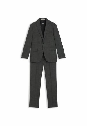 Completo a due pezzi in tessuto grigio scuro con una sottile texture. Giacca monopetto e pantaloni con gamba dritta, caratterizzati da un design slim fit.