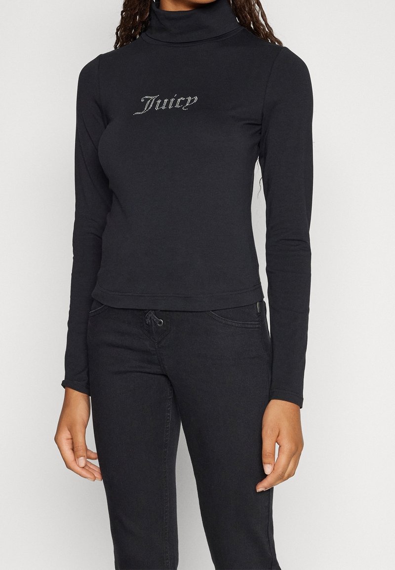 Black long-sleeve turtleneck top made of soft fabric, featuring a fitted design and a rhinestone "Juicy" logo on the front.