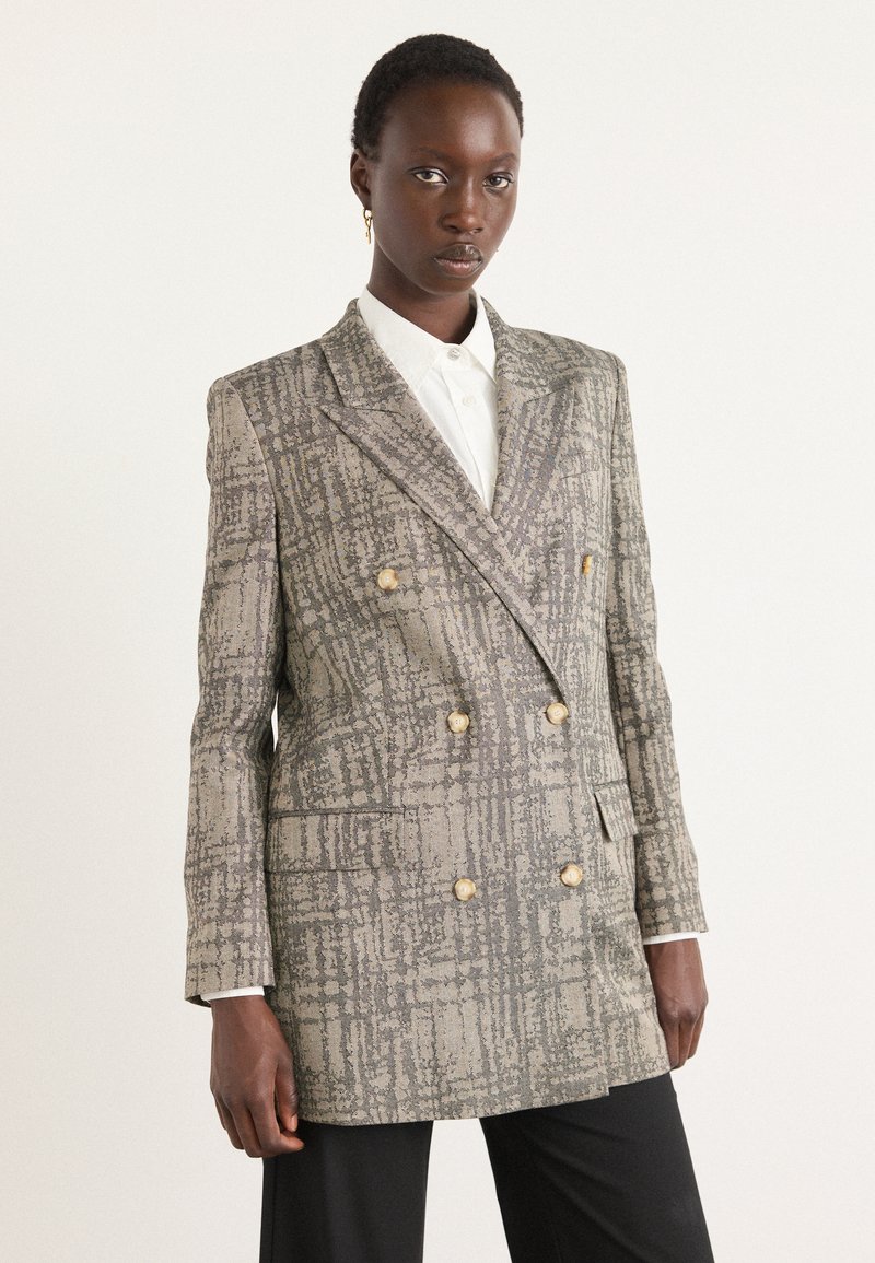 Doppelt gefütterte Blazer aus einem strukturierten grauen Stoff mit einem gemusterten Design, ausgestattet mit Knöpfen in Goldoptik und einer taillierten Passform.