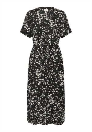 Abito nero a fiori con maniche corte, scollatura a V e vita con laccetto. Il tessuto presenta un motivo floreale bianco sparso ed è leggero.