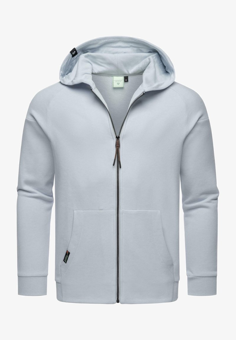 Felpa zip con cappuccio di colore azzurro chiaro, realizzata in tessuto morbido, dotata di cappuccio, due tasche frontali e polsini a coste per una vestibilità aderente.