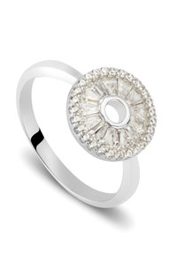 Ring with a polished silver band. Round centerpiece features a cluster of baguette and round clear crystals surrounding a central hole.