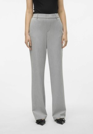 Gray, high-waisted trousers with a straight-leg design, textured fabric, and front pockets. Paired with black pointed-toe shoes.