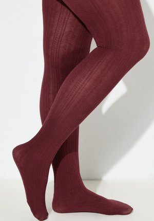 Burgundy patterned tights with a textured design, featuring a geometric pattern and a smooth finish, extending to the ankle.