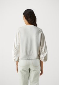 Pinko CERESOLE MAGLIA - Ikdienas džemperis - bianco latte
