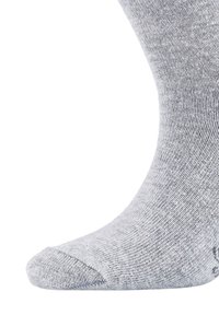 Chaussette en coton gris, texture lisse, forme effilée, bout renforcé et motif mélangé subtil ; design de longueur cheville.