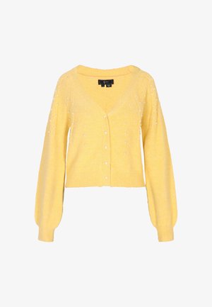 Žltý pletený kardigán s V-výstrihom, zapínaním na gombíky a nadýchanými rukávmi. Ozdobený malými perlovými aplikáciami. Krátky skrátený dizajn.