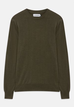 Mørk grønn genser med lange ermer og ribbestrikkede mansjetter og hem. Laget av mykt materiale, med en klassisk rund hals og minimalistisk design.