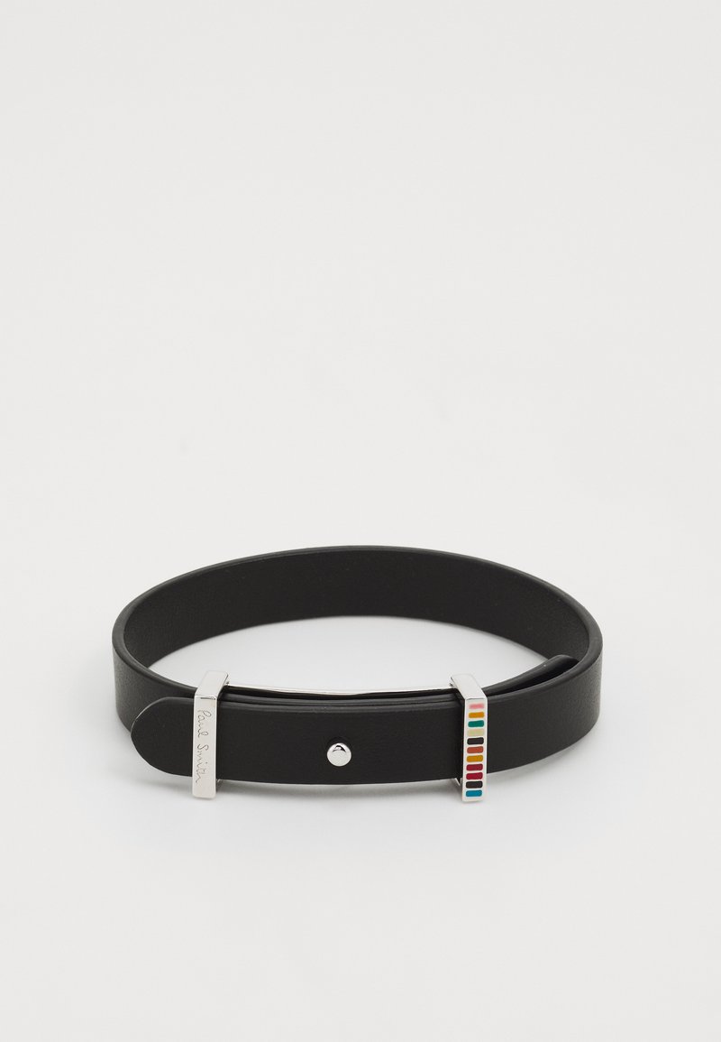 Black leather bracelet with a silver clasp, featuring a colorful striped accent and a central stud detail.