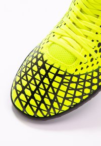 Puma Scarpe da calcio per terreni sintetici - yellow