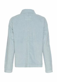 Veste en velours côtelé bleu clair à manches longues et col droit, vue de dos, montrant des détails de coutures verticales.