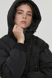 Black padded jacket with a zip and button closure, featuring a hood, ribbed cuffs, and side pockets with zippers. Smooth, glossy texture.