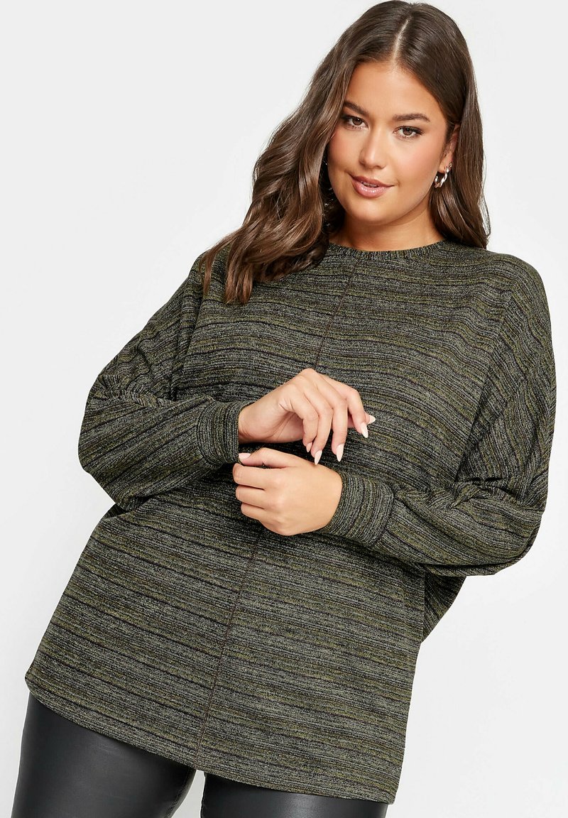 Mörkgrön och svart randig tröja med en avslappnad passform, rund halsringning och långa ärmar. Texturerad stickad tyg med lätt lyster.