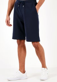 REGULAR FIT - Teplákové kalhoty - dark blue