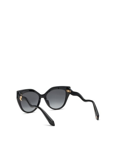 Lunettes de soleil noires œil de chat avec des verres dégradés foncés et des branches texturées en forme de serpent avec des accents dorés près des charnières.