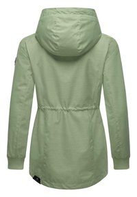 Light green jacket with a hood, cinched waist, and long sleeves. Smooth fabric texture and elastic cuffs. Features a logo tag at the hem.