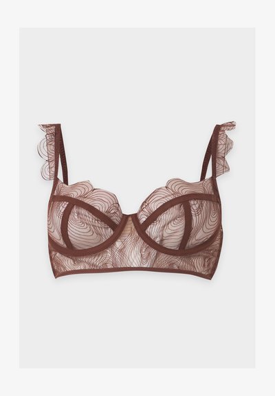 Soutien-gorge en dentelle marron transparente avec armature et fines bretelles, présentant des détails en dentelle ondulée sur les bonnets et des bords à volants sur les bretelles.