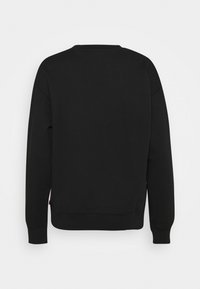 Sweat-shirt noir à manches longues, col rond et poignets côtelés. Tissu lisse de couleur unie, sans motifs ni accents visibles.