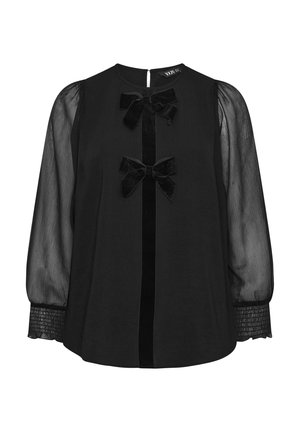 Blouse noire à manches longues en tulle, ornée de deux nœuds en velours et d'un accent en ruban au centre. Des poignets smockés texturés complètent le design.