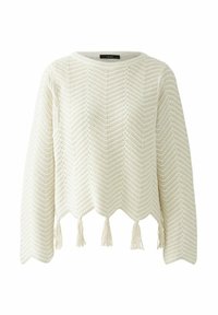 Weißer Strickpullover mit einem Zickzackmuster, gewelltem Saum und Quasten am unteren Rand. Lange Ärmel mit rundem Ausschnitt.