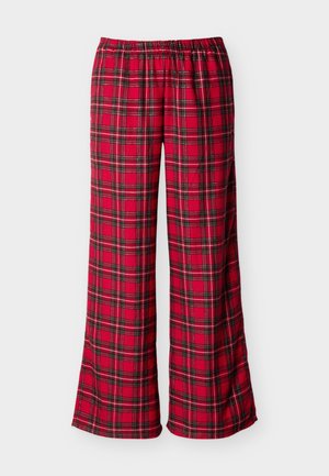 Red plaid pajama pants with an elastic waistband, featuring black and green stripes, wide legs, and a soft fabric texture.