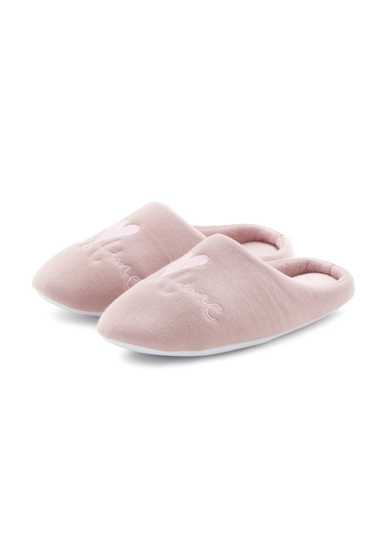 Roze stoffen slippers met een zachte textuur, een open achterkant en geborduurde "Home" details op de bovenkant. Witte zolen.