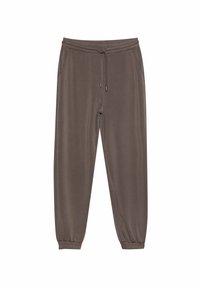 Bruine sweatpants met een elastische tailleband en trekkoord, voorzien van zijzakken en taps toelopende manchetten bij de enkels. Zachte stoftextuur.