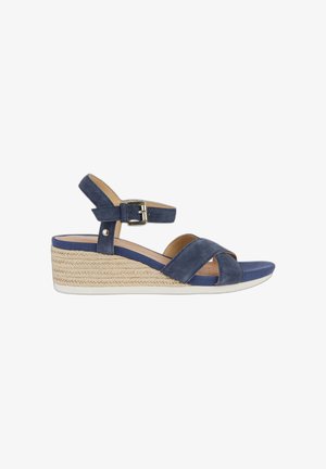 Sandalias de cuña azul de ante con tiras cruzadas y cierre de hebilla, con una plantilla de estilo yute trenzado y una suela de goma plana.