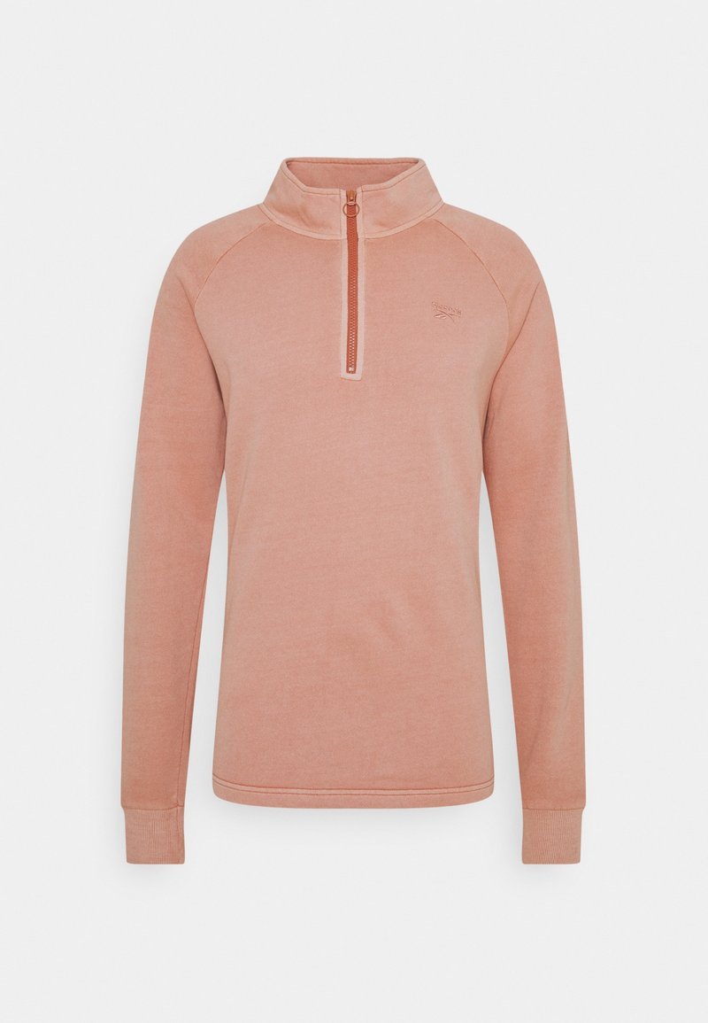 Pull à manches longues, rose clair, avec col montant et courte fermeture éclair à l'avant, présenté sur un fond gris uni.