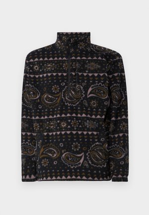 Zwarte fleece pullover met paisley- en geometrische patronen in bruin, roze en crème. Met een kwart-rits aan de voorkant en een hoge kraag.