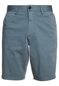 Světle modré bavlněné šortky s knoflíkovým zapínáním, plochým předním dílem a bočními kapsami. Mají hladký povrch a čistý lem.