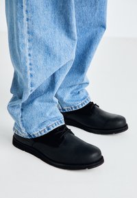 Levi's® Stivaletti stringati - black