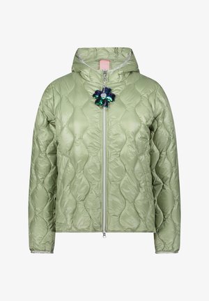 Light green quilted jacket with a hood, silver zipper, and a decorative flower patch with blue and green sequins on the front.
