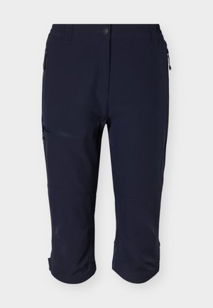 Marineblå knelang bukse med glidelåslommer på siden, knappelukking og smal passform, vist mot en enkel hvit bakgrunn.