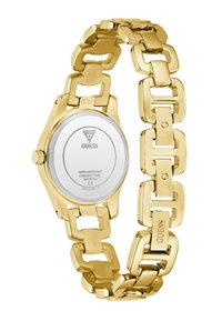 Auksinės spalvos metalinė grandinėlė su laikrodžio funkcija, su blizgiu nugariniu dangteliu, ant kurio išgraviruotas "Guess" logotipas ir vandens atsparumo detalės.