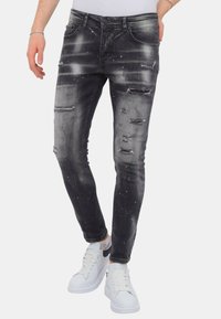 Local Fanatic DISTRESSED STOASH - Slim fit jeans - zwart